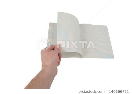 a person turns the page of an open checkered notebook on a light background a person turns the page of an open checkered notebook on a light background 140166721