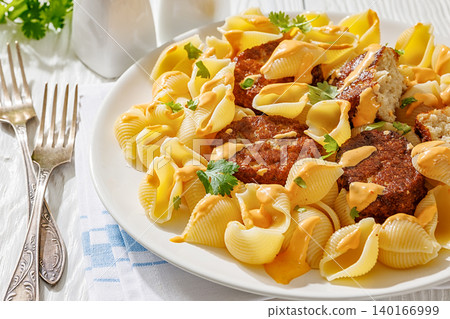 Shell Pasta And Meat Patties on a Plate Shell Pasta And Meat Patties on a Plate 140166999
