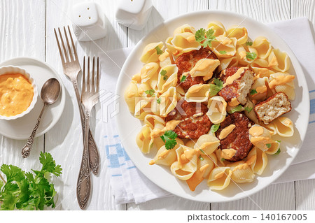 Shell Pasta And Meat Patties on a Plate Shell Pasta And Meat Patties on a Plate 140167005