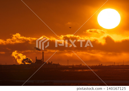 A fantastic sunset view of Kushiro city from the Hosooka Observatory in the Kushiro Marshland. A fantastic sunset view of Kushiro city from the Hosooka Observatory in the Kushiro Marshland. 140167125