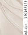 Smooth elegant golden silk or satin luxury cloth texture as wedding background. Luxurious background design. In Sepia toned. Retro style 140168176