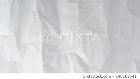 White crumpled paper background, blank wrinkled sheet White crumpled paper background, blank wrinkled sheet 140168541