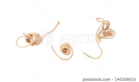 String piece isolated, jute rope fragment, part of packaging cord knots, eco-friendly natural rope String piece isolated, jute rope fragment, part of packaging cord knots, eco-friendly natural rope 140168610