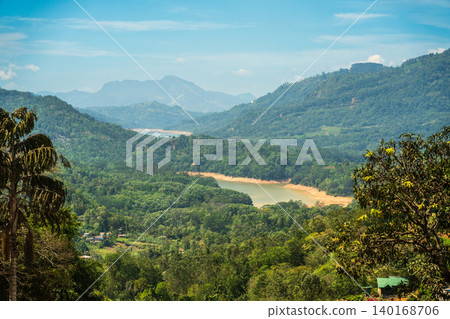Lush greenery and lakes among green mountains and jungle 140168706