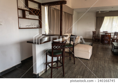 Asian hotel room mini-bar area with wooden bar counter Asian hotel room mini-bar area with wooden bar counter 140168745
