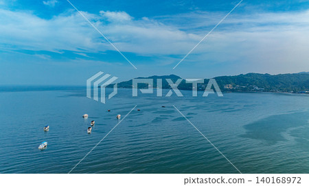 Aerial View of Patong Beach with Coastal Cleaning Activity Aerial View of Patong Beach with Coastal Cleaning Activity 140168972