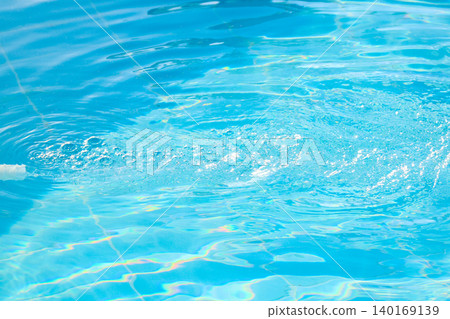Powerful Water Jet Filling a Pool, Captivating Splash and Flow Creating a Refreshing Oasis Under the Sun Powerful Water Jet Filling a Pool, Captivating Splash and Flow Creating a Refreshing Oasis Under the Sun 140169139
