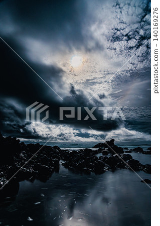 The sound of waves under the moonlight echoes along the rocky shores of Tanegashima Island. 140169276