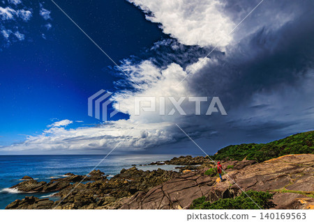 The spectacular view of Itajikibana overlooking the rugged reefs and the night sea. The spectacular view of Itajikibana overlooking the rugged reefs and the night sea. 140169563