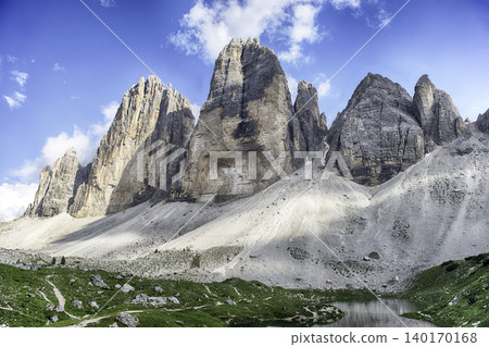 Tre Cime di Lavaredo reflecting in mountain lake, Dolomites, Italy Tre Cime di Lavaredo reflecting in mountain lake, Dolomites, Italy 140170168