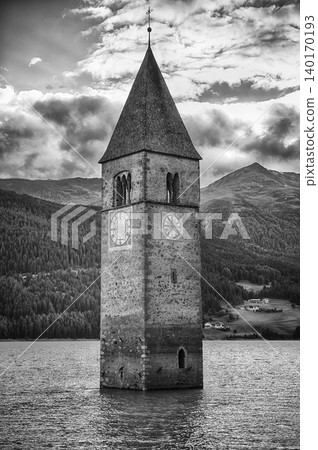 The iconic submerged Church Tower of Graun, Lake Reschensee, Italy 140170193