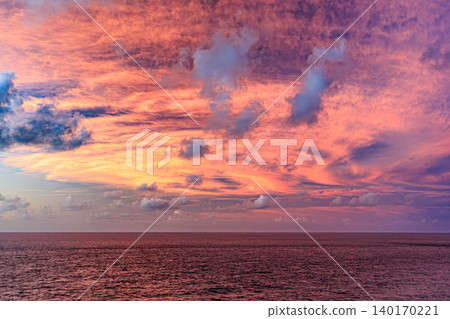 The fantastical sunrise paints the sky over Cape Kadokura on Tanegashima Island. The fantastical sunrise paints the sky over Cape Kadokura on Tanegashima Island. 140170221