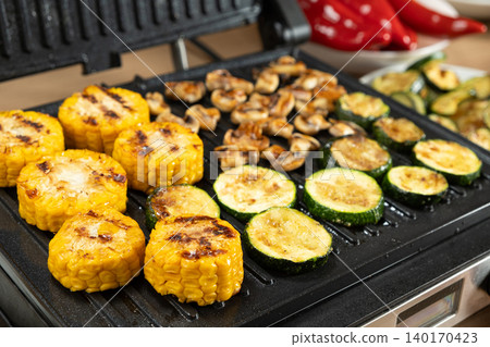 Assorted Grilled Vegetables and Mushrooms on Electric Contact Grill Assorted Grilled Vegetables and Mushrooms on Electric Contact Grill 140170423
