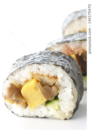 Eel sushi roll photographed against a white background Eel sushi roll photographed against a white background 140170470
