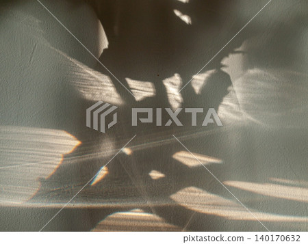 Abstract composition of a sunset light caustic effect and two glass vases. 140170632