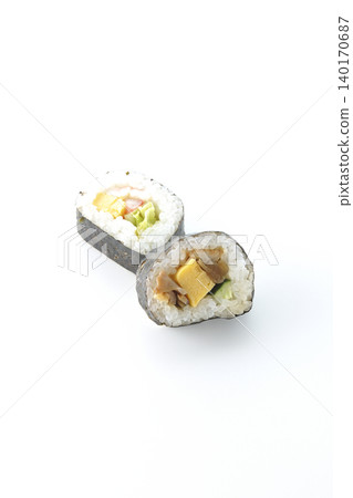 Eel roll sushi and salad roll photographed against a white background. Eel roll sushi and salad roll photographed against a white background. 140170687