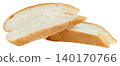 Two fresh slices of white wheat bread isolated. Diagonal cut of soft crusty baguette or Italian bread. Ideal for food packaging and culinary design projects. 140170766