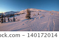 Alpine resort ski slopes and lifts. Pre sunrise morning Svydovets mountain ridge and snow-covered fir trees view, Dragobrat, Ukraine Carpathians. 140172014