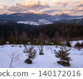 Winter evening sunset mountains (Ukraine, Carpathians -  mountain peaks Khomyak and Synyak scenery view from Yablunytsia Pass). 140172016