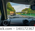 Scenery while driving on the highway 140172367