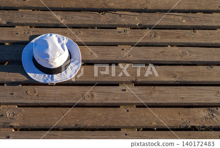 White Hat with Black Band on Pier at Spanish Beach 140172483