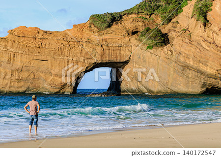 The Elephant's Watering Hole Arch stands on the coast of Tanegashima Island. 140172547
