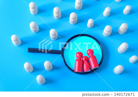 Wooden figures on magnifying glass,Recruitment employee concept. 140172671