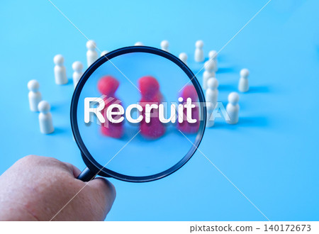 Wooden figures on magnifying glass,Recruitment employee concept. 140172673