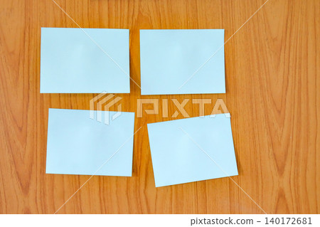 Sticky paper note on wooden wall. Sticky paper note on wooden wall. 140172681