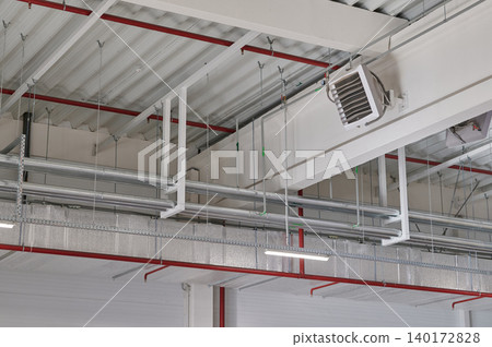 Industrial ceiling with modern fixtures and lines Industrial ceiling with modern fixtures and lines 140172828
