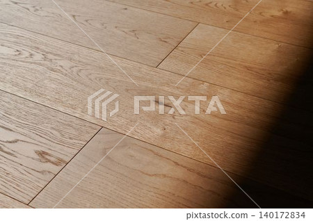 Natural warmth radiates from oak floor texture 140172834
