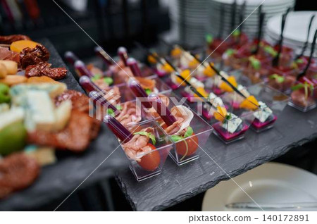 Elegant appetizer display at a festive event Elegant appetizer display at a festive event 140172891