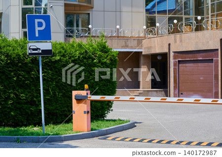 Gate and signage greet visitors at parking Gate and signage greet visitors at parking 140172987