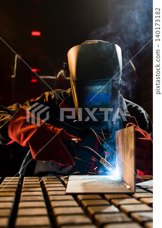 Skilled welder creates art in sparks and metal Skilled welder creates art in sparks and metal 140173182