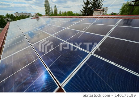Solar panels gleam on city rooftops Solar panels gleam on city rooftops 140173199