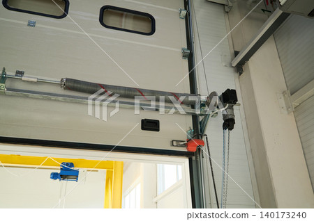Innovations in industrial door mechanics at work Innovations in industrial door mechanics at work 140173240