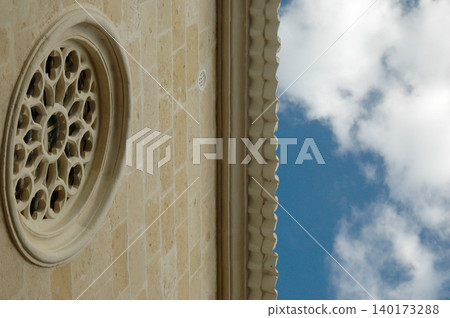 low angle of a rose window of a catholic church  140173288