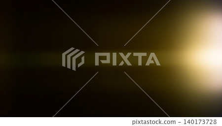 Anamorphic lens flare and light leak effect on dark background. Minimal cinematic optical texture ideal for overlays, film production, motion graphics and visual effects. 140173728