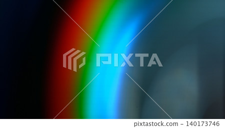 Vivid color spectrum light leak with smooth gradient transitions and optical glow. Abstract cinematic background suitable for overlays, visual effects and creative projects. 140173746