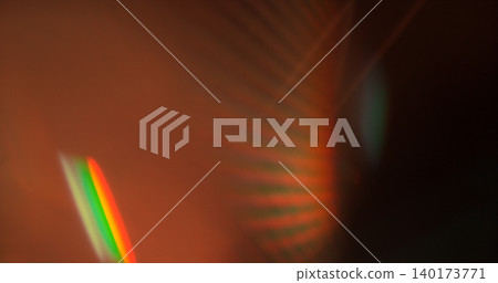Abstract RGB prism lens flare with colorful light refraction and optical distortion. Creative cinematic background suitable for visual effects, overlays and modern digital design. 140173771