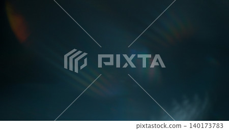 Abstract RGB prism lens flare with colorful light refraction and optical distortion. Creative cinematic background suitable for visual effects, overlays and modern digital design. 140173783