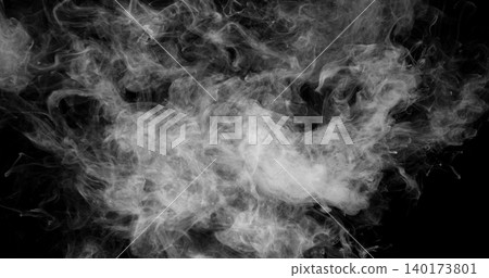 Delicate white smoke wisps drifting across a dark background. Atmospheric abstract texture with soft swirling patterns, ideal for creative design, overlays and visual effects projects. Delicate white smoke wisps drifting across a dark background. Atmospheric abstract texture with soft swirling patterns, ideal for creative design, overlays and visual effects projects. 140173801