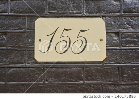 Unique Street Number 155 on a Charming Building in the Heart of Amsterdam, Showcasing Local Architectural Style 140173886