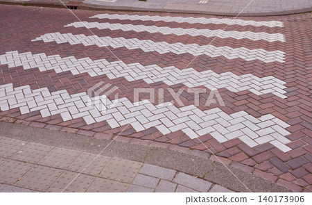 Waves of Design in Amsterdam's City Center With Artistic Crosswalk Patterns in Vibrant Brickwork Waves of Design in Amsterdam's City Center With Artistic Crosswalk Patterns in Vibrant Brickwork 140173906
