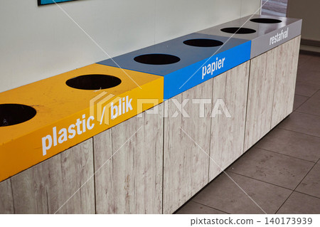 Colorful Recycling Bins Promoting Environmental Awareness in Vibrant City Center Colorful Recycling Bins Promoting Environmental Awareness in Vibrant City Center 140173939