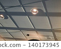 Unique Ceiling Design With Modern Lights Casting Intriguing Shadows in a Cafe Setting in Vibrant City Center 140173945