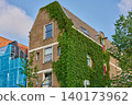 Explore the Charming Ivy-Covered Buildings, Where History Meets Vibrant City Life 140173962