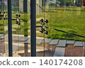 Reflection of City Life in Park With Modern Architecture and Green Landscapes. 140174208