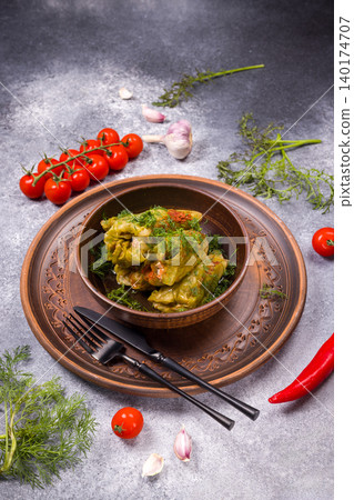 Traditional stuffed cabbage rolls serving with fresh dill 140174707