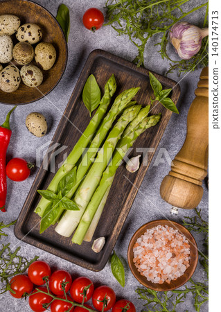 Fresh green asparagus, quail eggs, and cherry tomatoes Fresh green asparagus, quail eggs, and cherry tomatoes 140174713